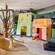 A children's play area featuring ragdolls, games and playhouses